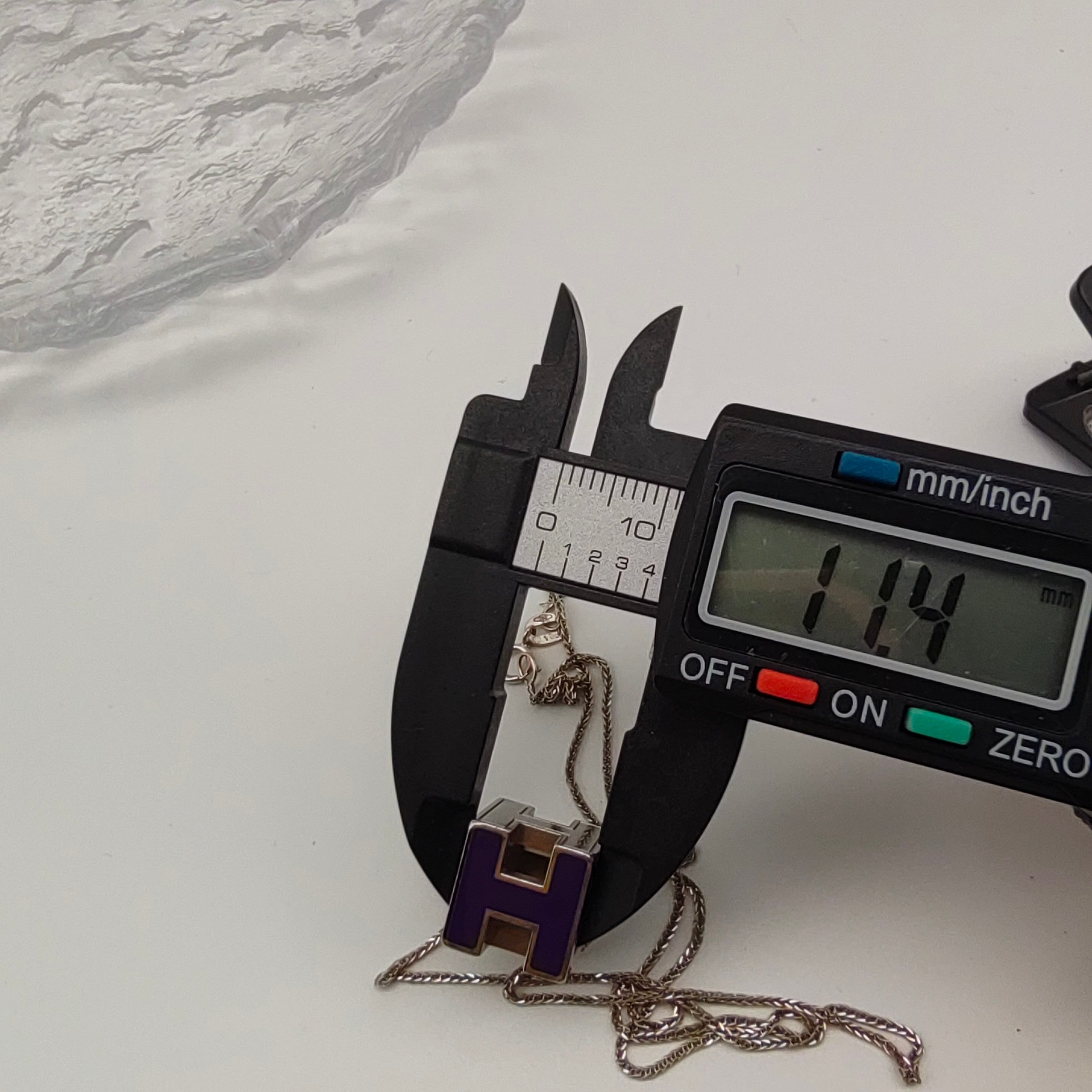 Hermes Purple Pendant