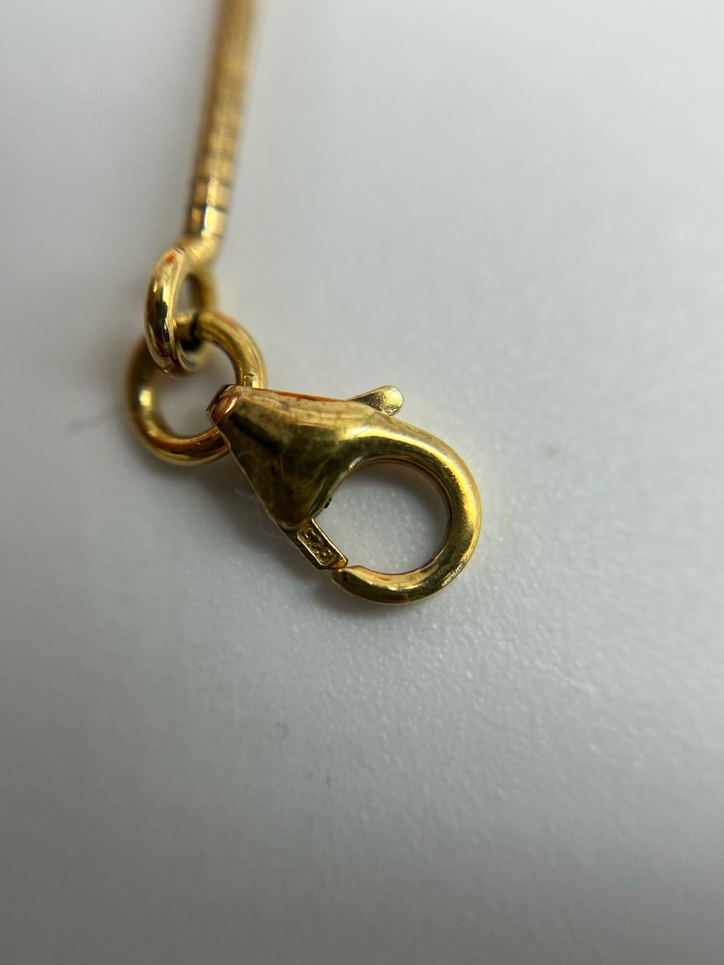 Hermes Gold Pendant