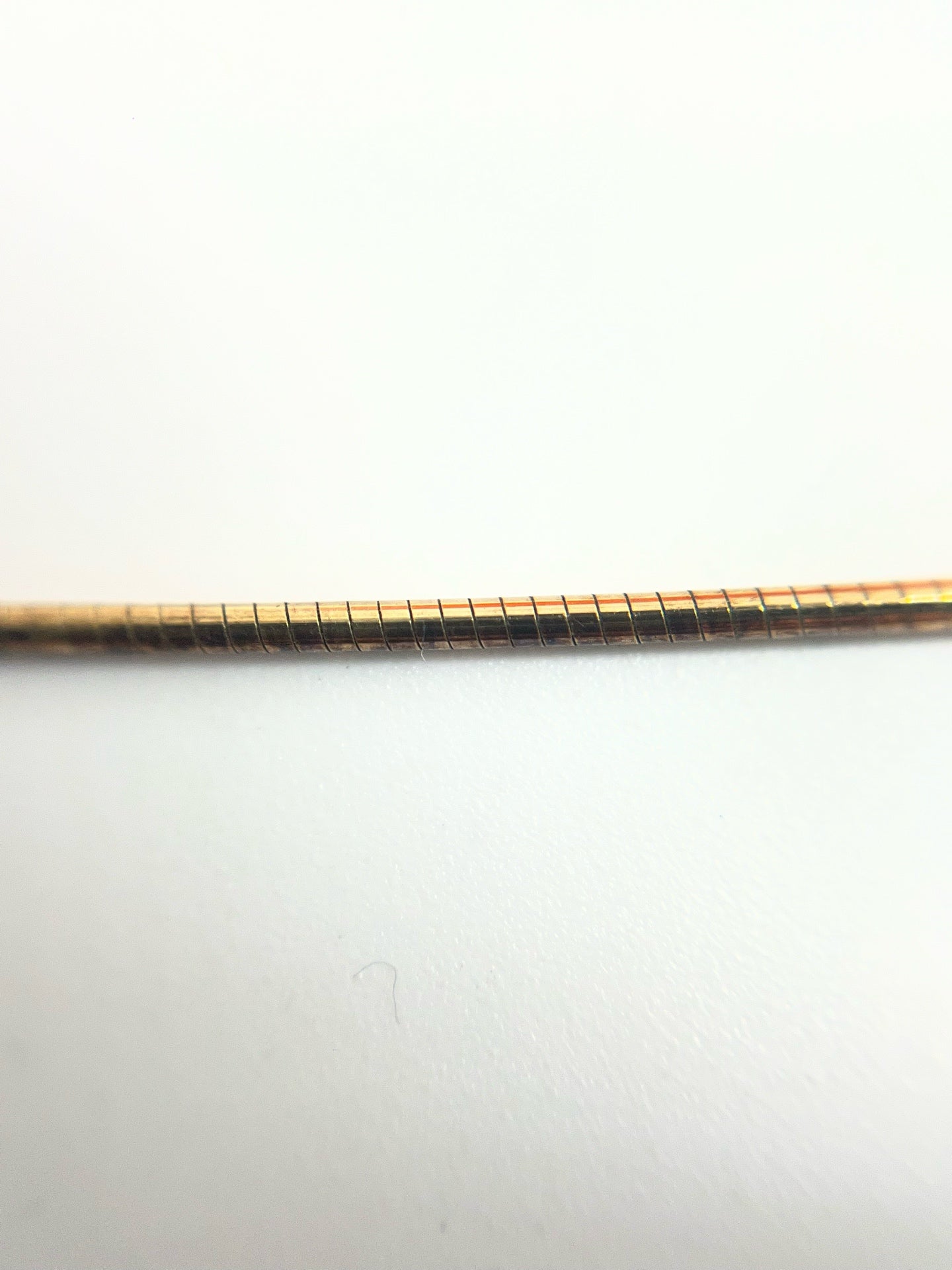 Hermes Gold Pendant
