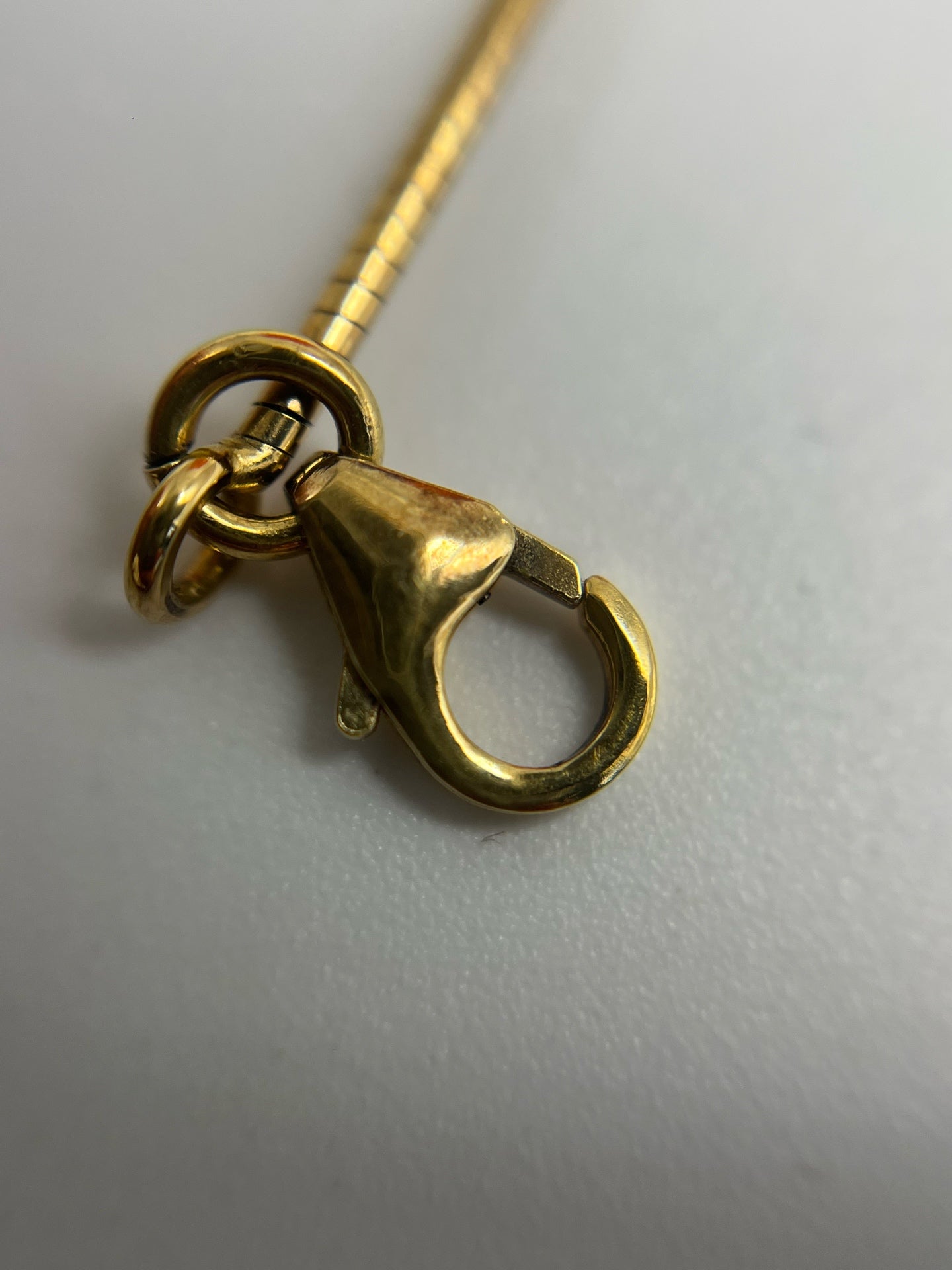Hermes Gold Pendant
