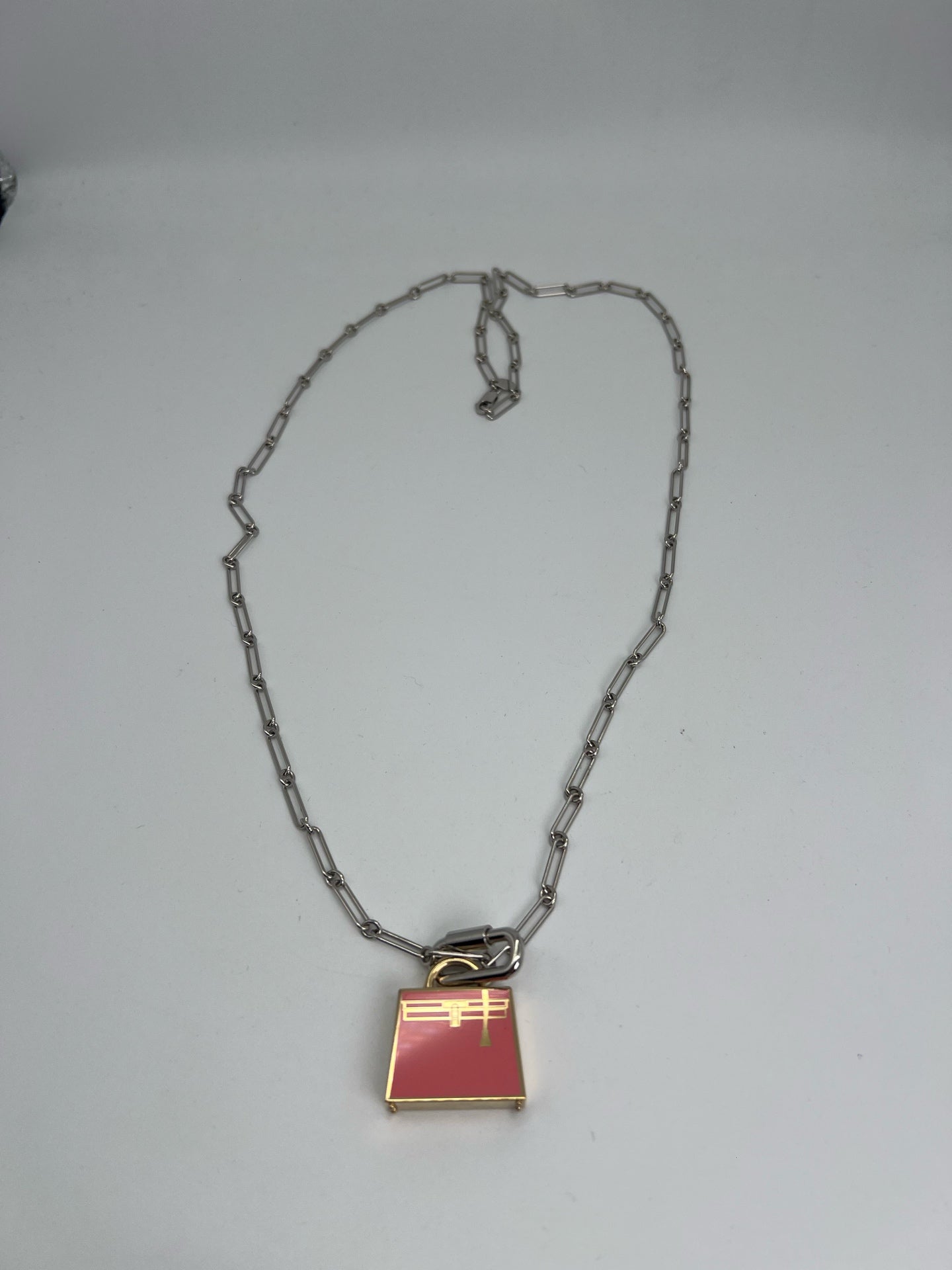 Hermes Silver Pendant