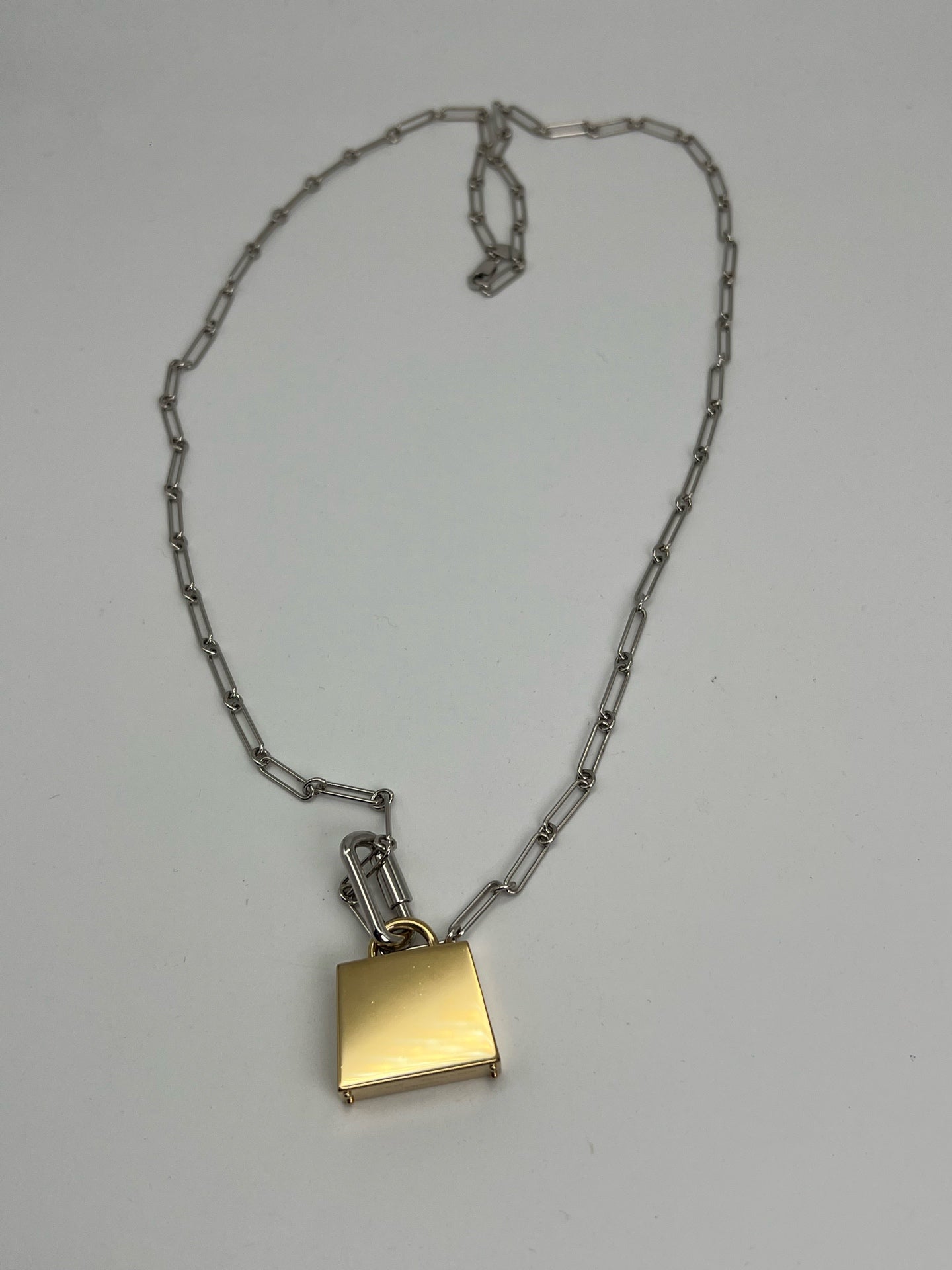 Hermes Silver Pendant