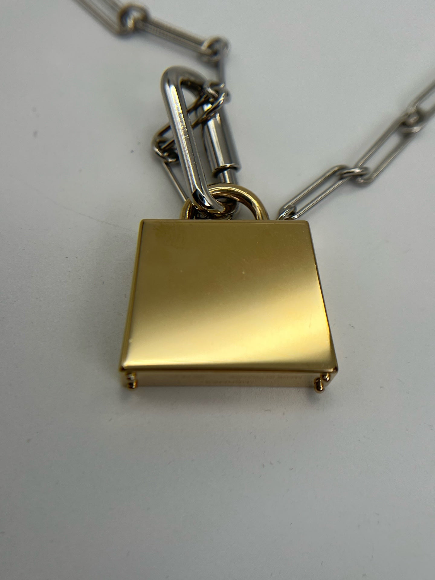 Hermes Silver Pendant