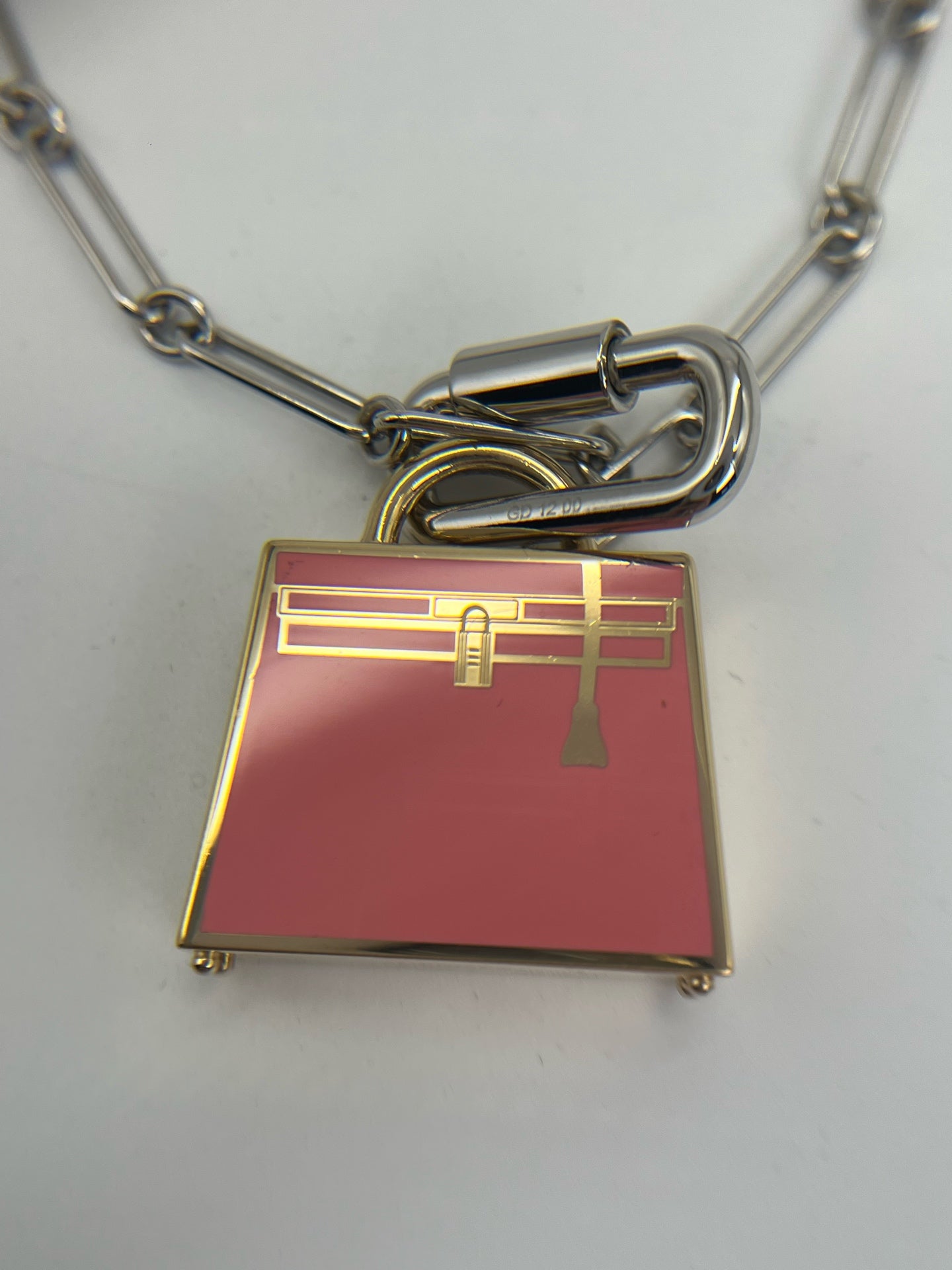 Hermes Silver Pendant